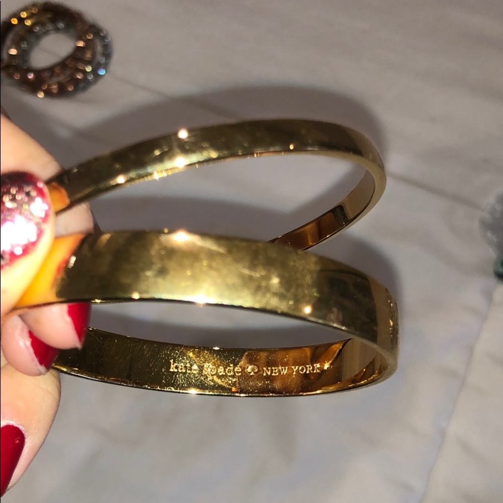2 Gold Kate Spade Bangles